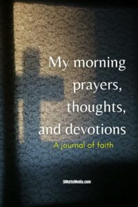 image of cross in shadow on prayer journal book
